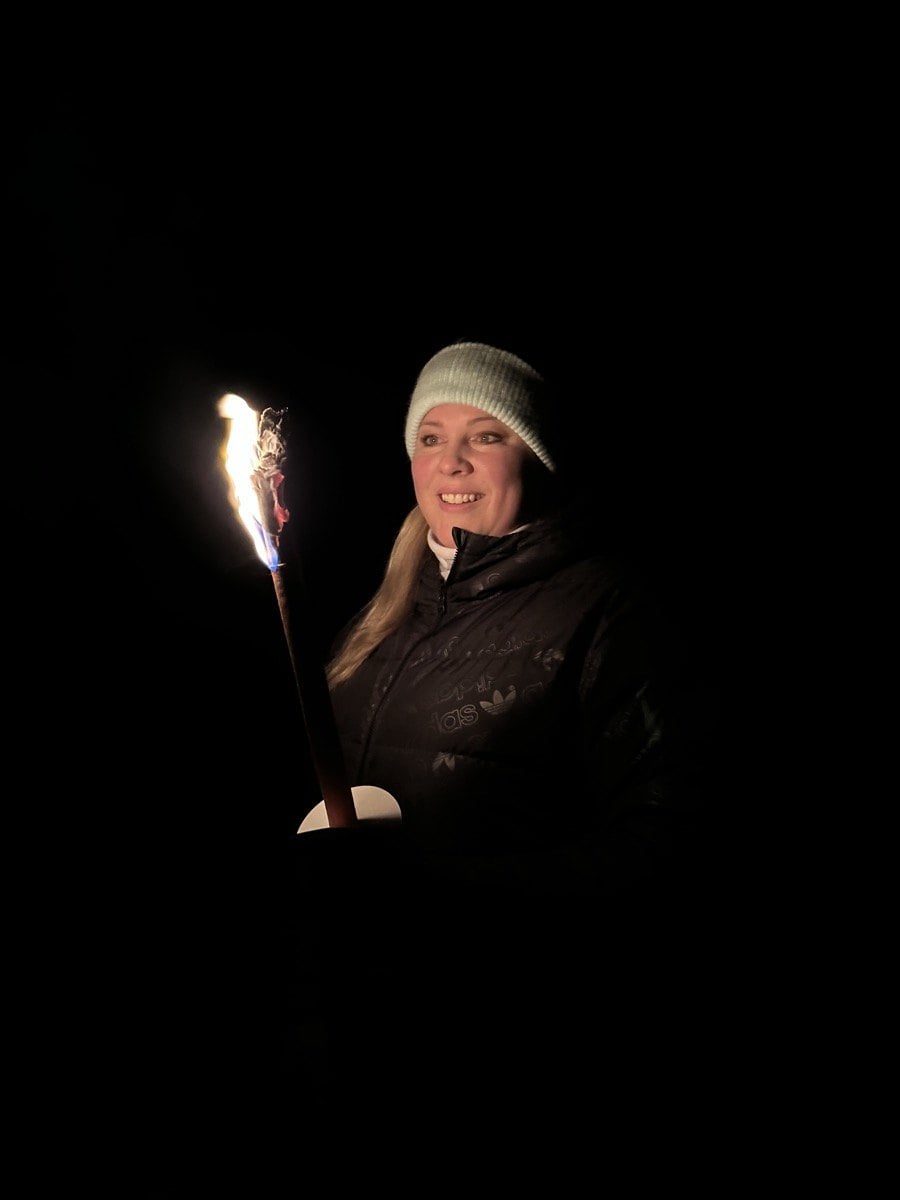 Chantal Weibel by torchlight on a winter evening